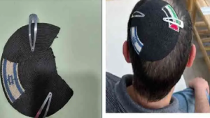 শিক্ষকের টুপি থেকে ফিলিস্তিনের পতাকা কেটে ফেললো ইসরায়েলি পুলিশ