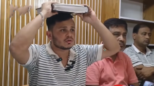 ‘আমি অপহরণ করিনি’ কুরআন মাথায় নিয়ে যুবদল নেতার শপথ
